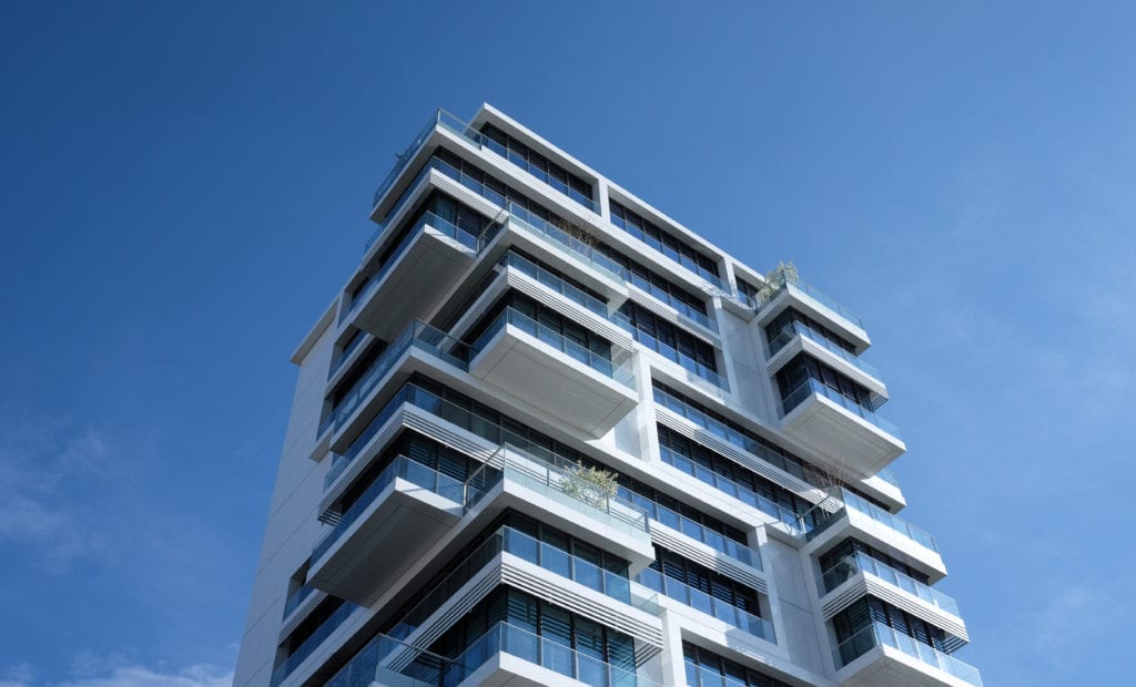 Tall condo highlighting Real Estate Development